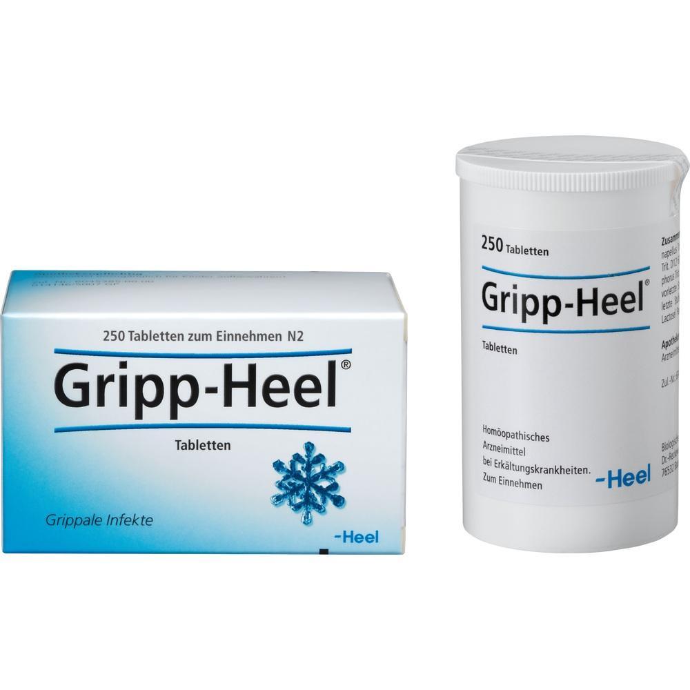 Eine Schachtel und Dose von Gripp-Heel Tabletten gegen Erk&auml;ltungen.