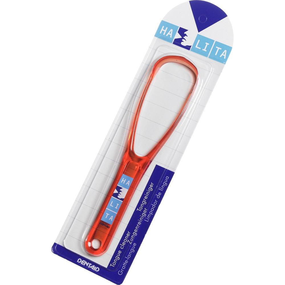 Ein roter Zungenreiniger in einer Verpackung.