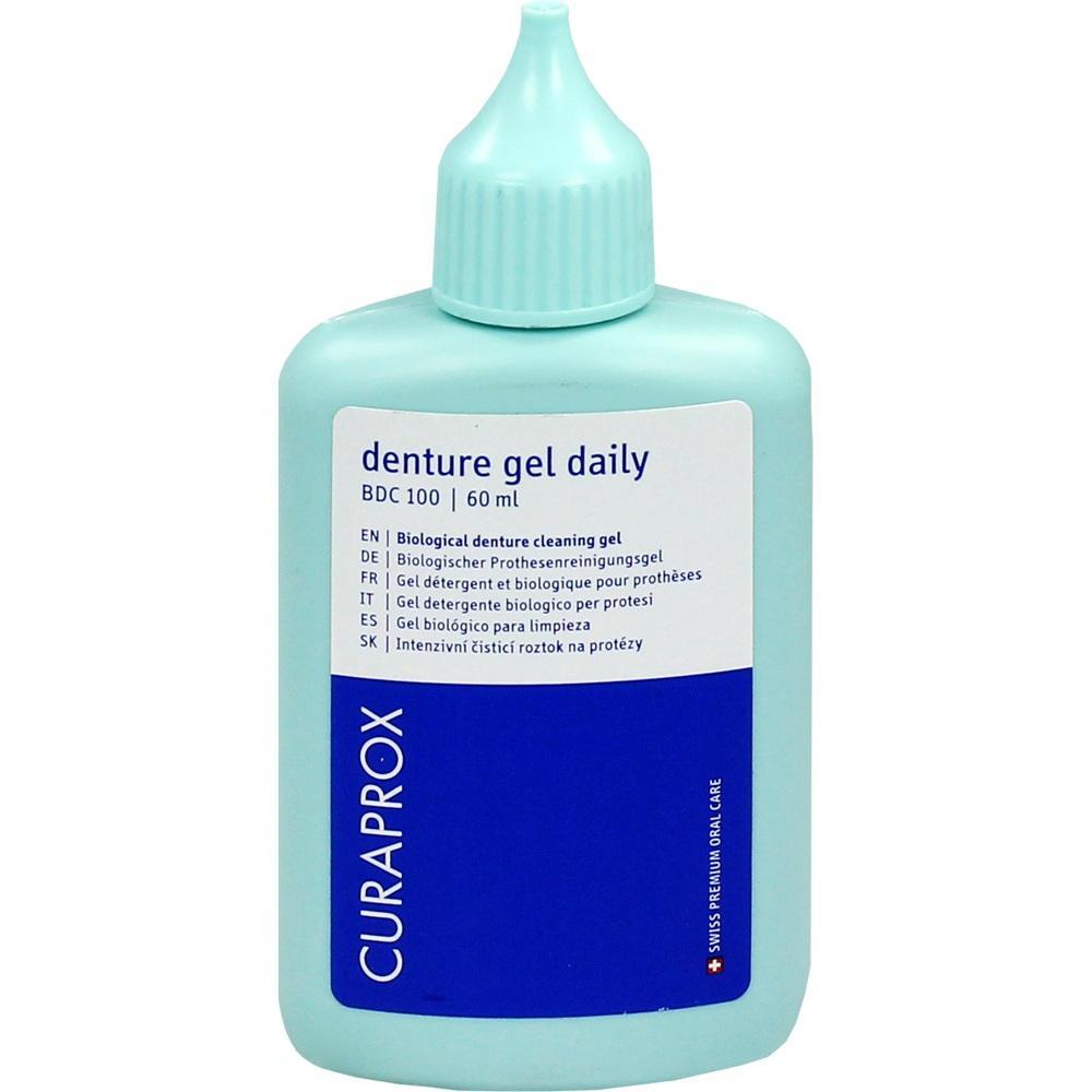 Eine hellblaue Flasche mit etikett als Zahngel f&uuml;r Zahnprothesen.