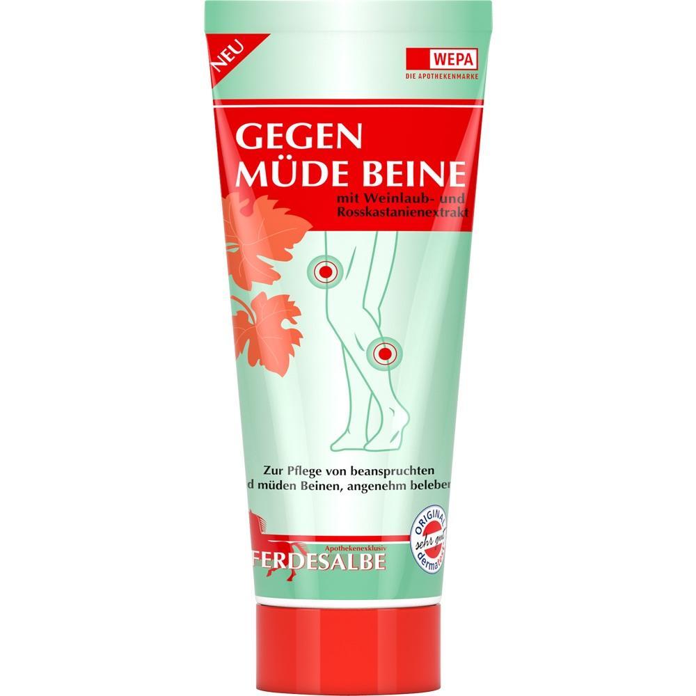 Eine grüne Tube mit Creme gegen müde Beine und Pflanzenextrakt.